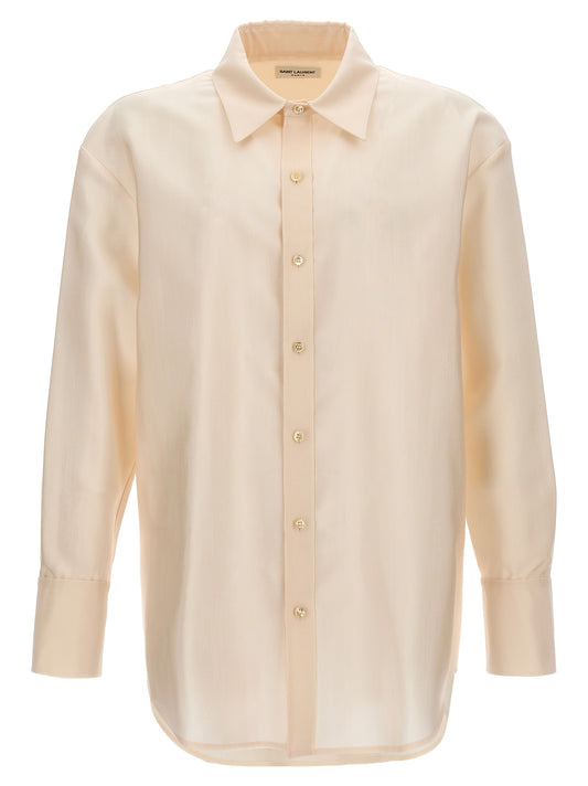 Beige shirt with gold buttons on a white background